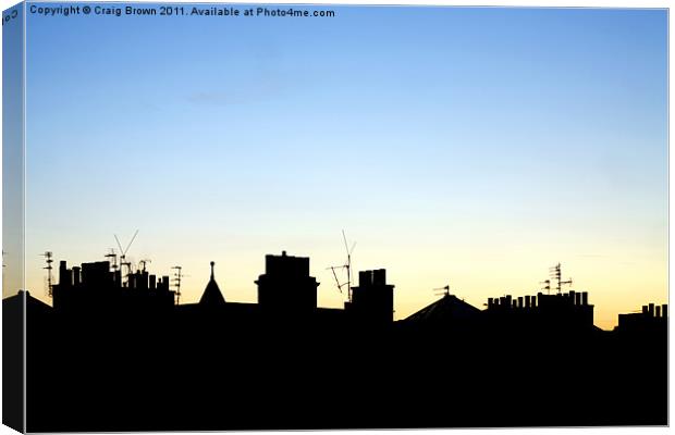 Silhouetted Rooftops at Dusk Canvas Print by Craig Brown