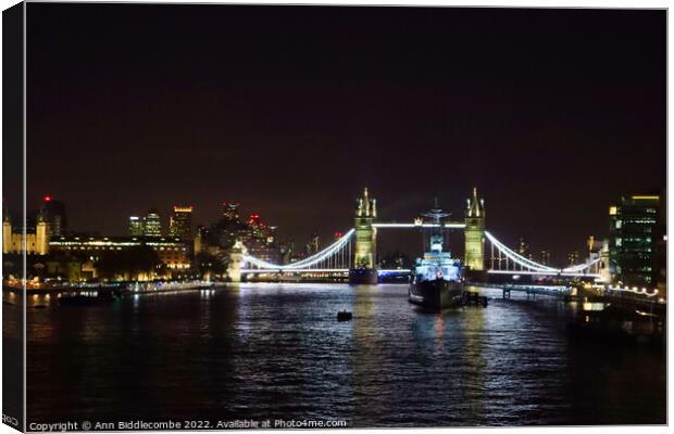 Tower bridge from London Bridge at night Canvas Print by Ann Biddlecombe
