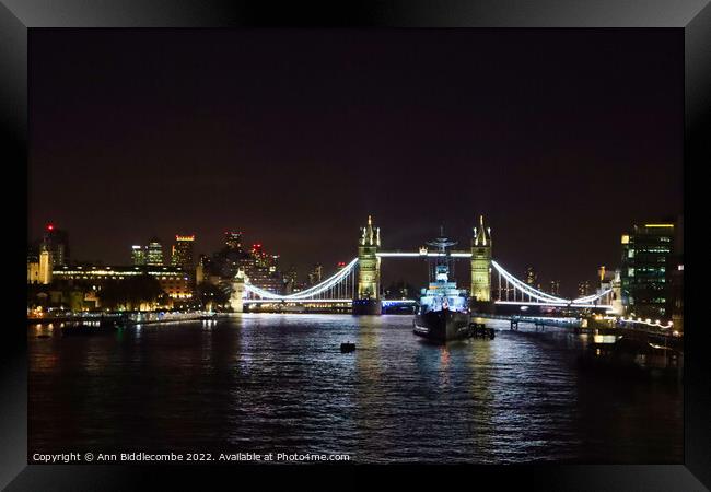 Tower bridge from London Bridge at night Framed Print by Ann Biddlecombe