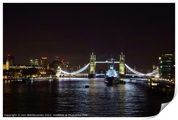Tower bridge from London Bridge at night Print by Ann Biddlecombe