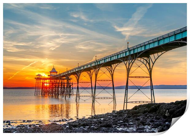 Clevedon Pier on a bright evening with colourful reflections Print by Rory Hailes