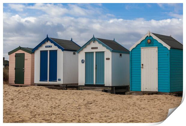 A Colourful Array of Beach Huts Print by Kevin Snelling