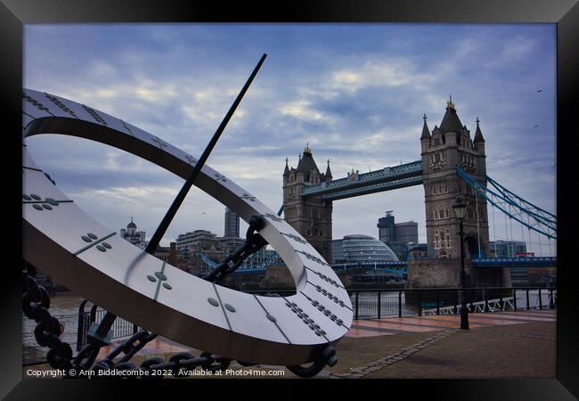 Sundial with tower bridge Framed Print by Ann Biddlecombe