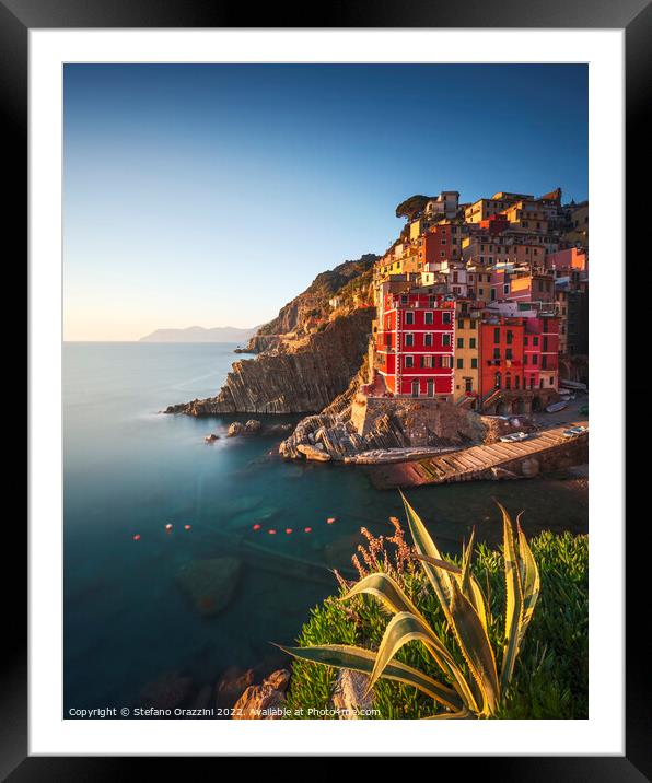 Riomaggiore town, cape and sea at sunset. Cinque Terre, Liguria, Framed Mounted Print by Stefano Orazzini