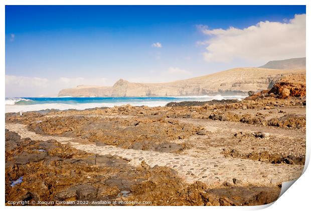 Atlantic rocky coast washed by the ocean on a sunny day with blu Print by Joaquin Corbalan