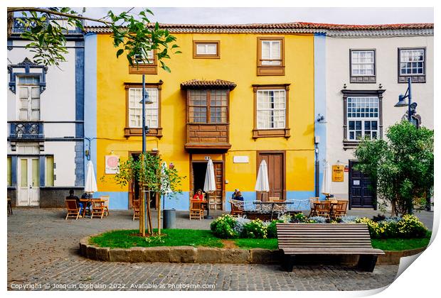  Colorful facades in the streets of the old town of San cristoba Print by Joaquin Corbalan