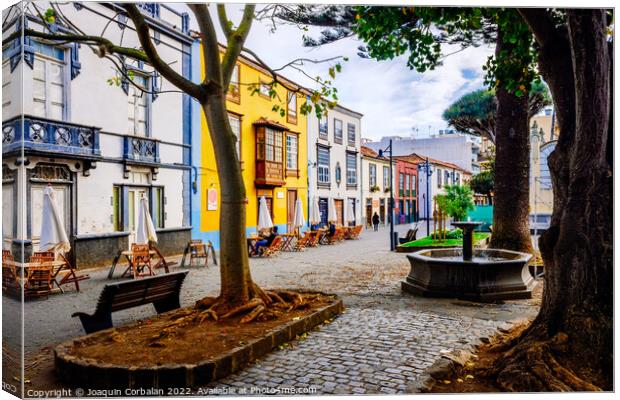  Colorful facades in the streets of the old town of San cristoba Canvas Print by Joaquin Corbalan