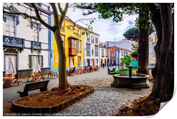 Colorful facades in the streets of the old town of San cristoba Print by Joaquin Corbalan