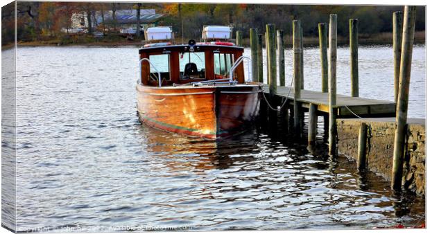 Water Taxi, Derwent water, Cumbria. Canvas Print by john hill