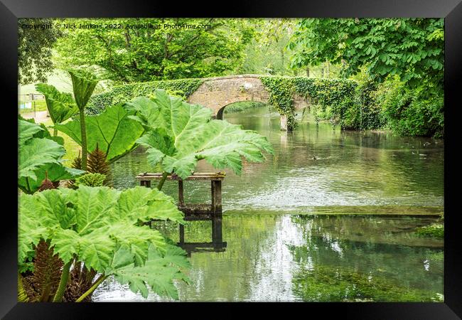 River Eye with footbridge at Lower Slaughter Cotswolds Framed Print by Nick Jenkins