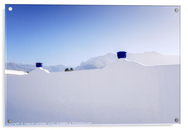 A sunny day to see the mountains behind the whitewashed wall of  Acrylic by Joaquin Corbalan