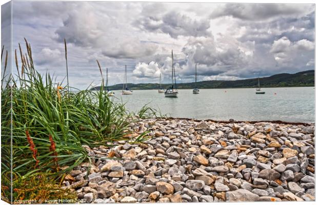 Yachts moored in Red Wharf Bay Canvas Print by Kevin Hellon