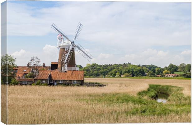 Cley Windmill behind the wetlands Canvas Print by Jason Wells