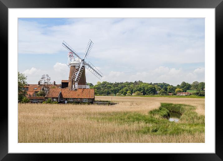 Cley Windmill behind the wetlands Framed Mounted Print by Jason Wells