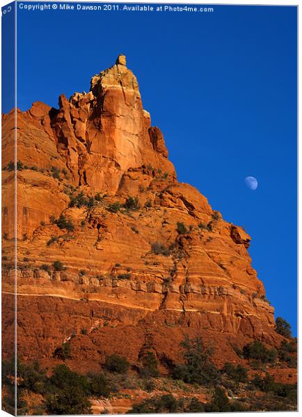 Moonrise over Red Rock Canvas Print by Mike Dawson