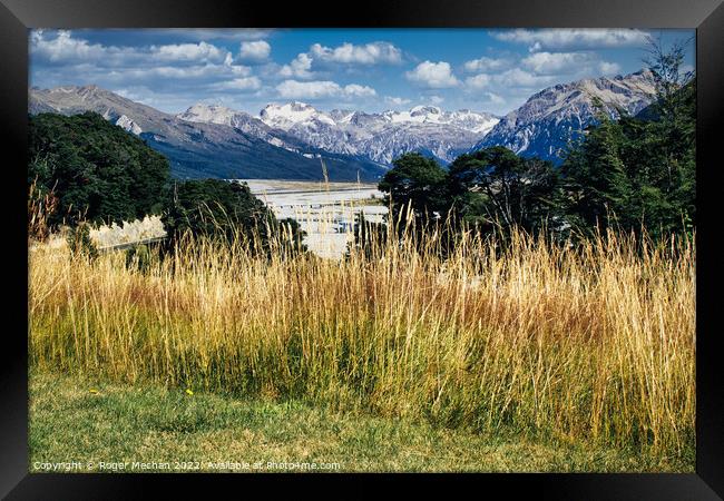 Snowcapped Mountains in Arthurs Pass Framed Print by Roger Mechan