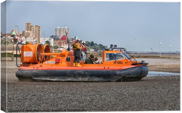 Heroic RNLI Hovercraft Rescues Lives Canvas Print by Peter Bolton