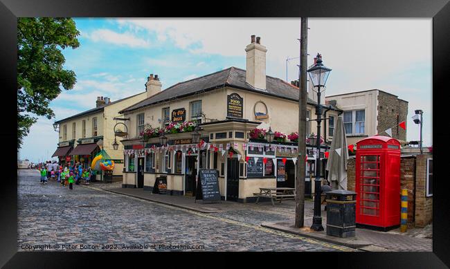 A Historic Pub with Picturesque Views Framed Print by Peter Bolton