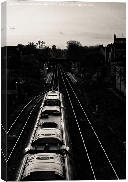 Heading home on the rails Canvas Print by Duncan Savidge