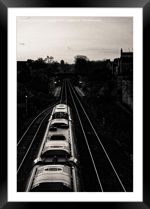 Heading home on the rails Framed Mounted Print by Duncan Savidge