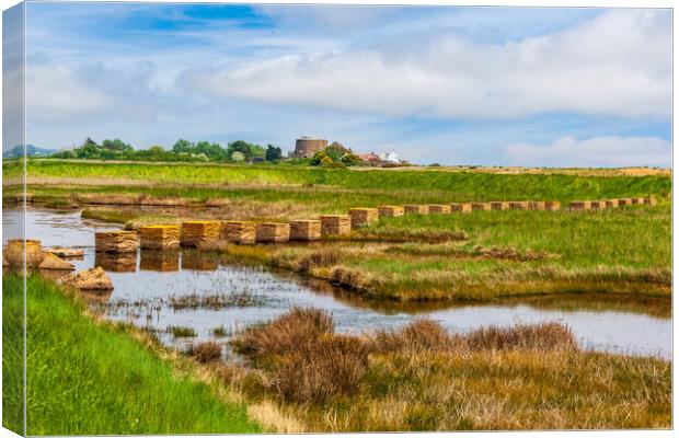 Tank traps at shingle street  Canvas Print by Kevin Snelling