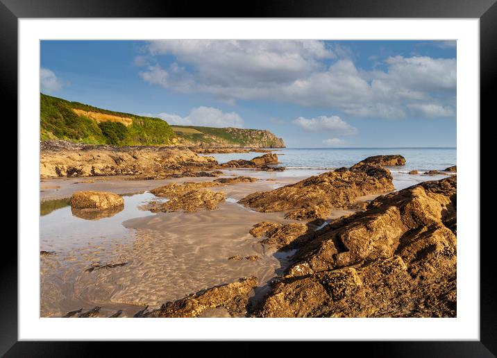 A rocky beach at pendower cornwall Framed Mounted Print by Kevin Snelling