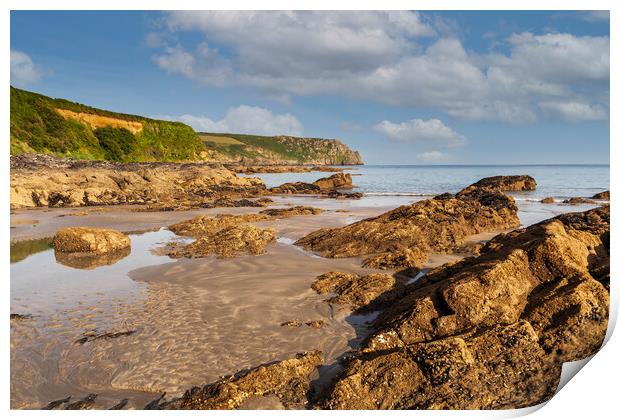 A rocky beach at pendower cornwall Print by Kevin Snelling