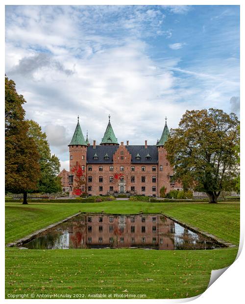 Trolleholm Castle Reflected in Water Print by Antony McAulay