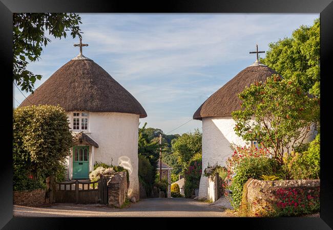 Charming Thatched Round Houses Framed Print by Kevin Snelling