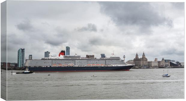 Queen Elizabeth cruise liner in front of the Liverpool waterfron Canvas Print by Jason Wells