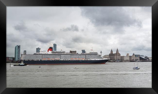 Queen Elizabeth cruise liner in front of the Liverpool waterfron Framed Print by Jason Wells