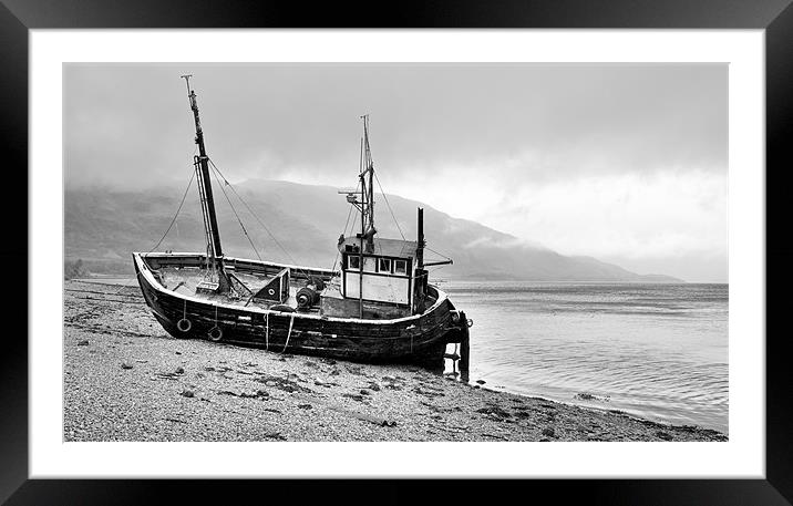 Beached fishing boat Framed Mounted Print by Gary Eason