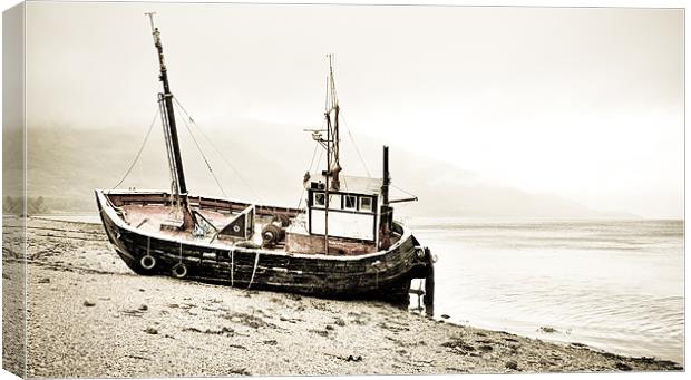 Beached fishing boat Canvas Print by Gary Eason