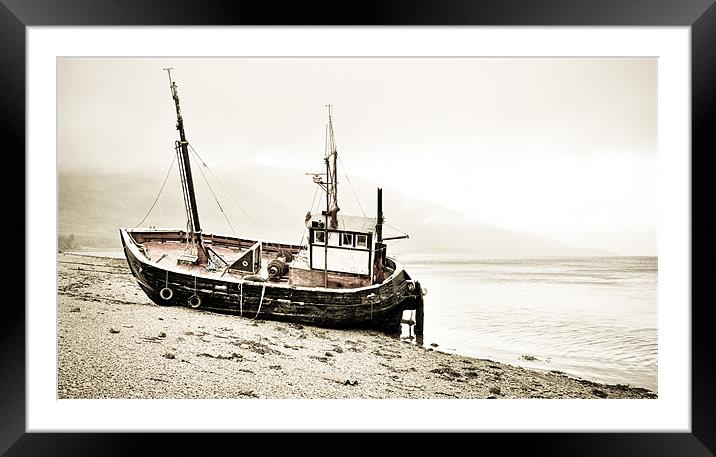 Beached fishing boat Framed Mounted Print by Gary Eason