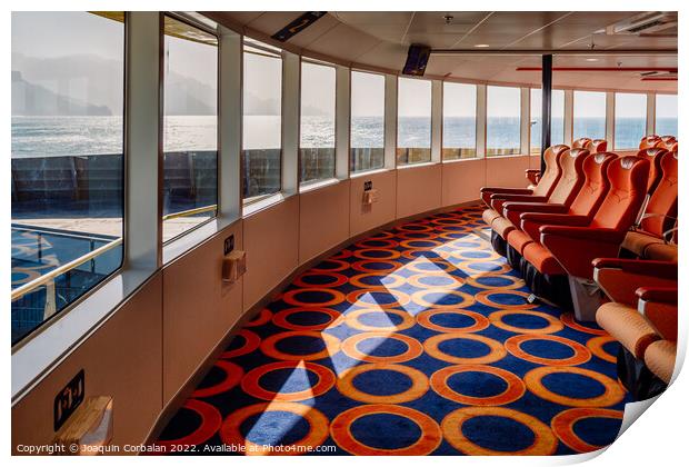 Empty seats inside a maritime ferry for passengers, before saili Print by Joaquin Corbalan