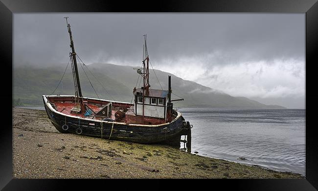 Beached fishing boat Framed Print by Gary Eason