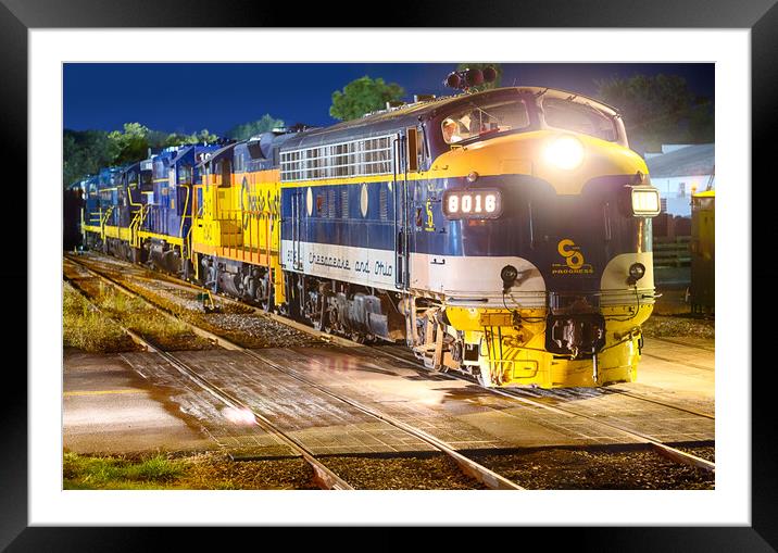 Diesel railroad engine at night Framed Mounted Print by Steve Heap