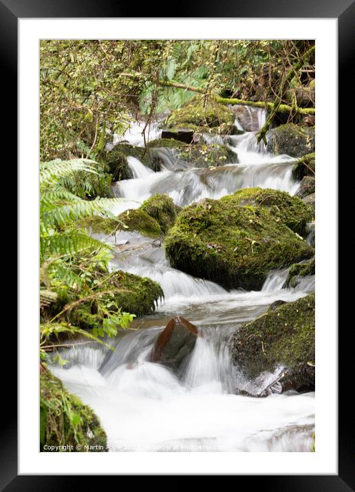 Cascading water in woods Framed Mounted Print by Martin Pople