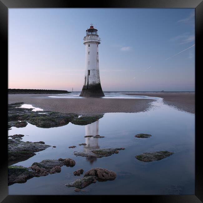 Perch Rock lighthouse reflection Framed Print by Ann Goodall