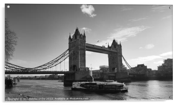 Monochrome tower bridge with tourist boat Acrylic by Ann Biddlecombe