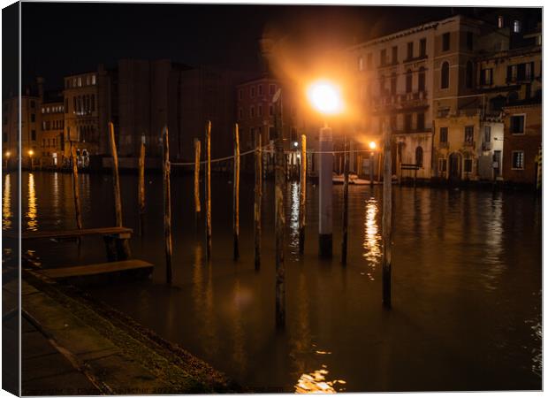 Mooring Posts on Canal Grande, Venice, at Night Canvas Print by Dietmar Rauscher