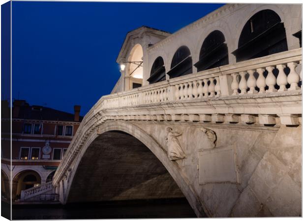 Rialto Bridge in Venice, Italy at Night Canvas Print by Dietmar Rauscher