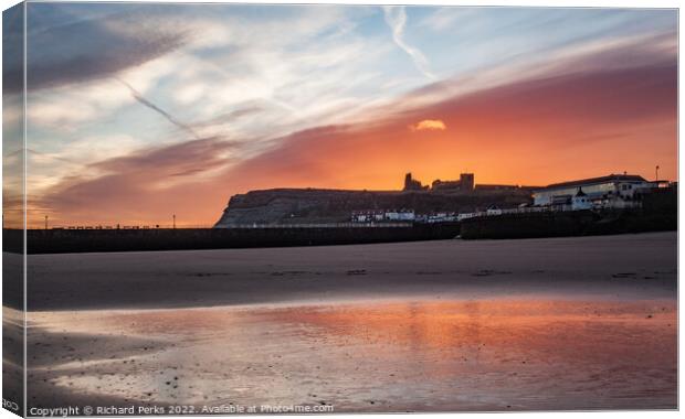 Fiery skies over Whitby Abbey Canvas Print by Richard Perks