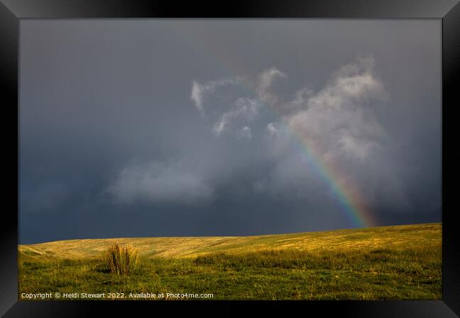 Dark Skies and Rainbow Framed Print by Heidi Stewart