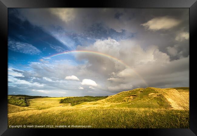 Rainbow Over Southerndown Framed Print by Heidi Stewart