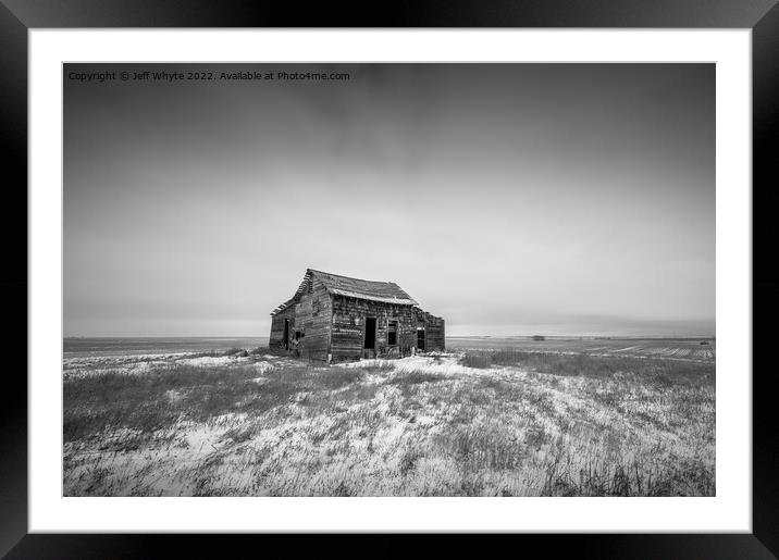 Abandoned building in winter Framed Mounted Print by Jeff Whyte