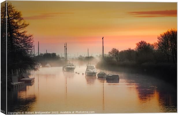 Misty sunrise on the River Frome Canvas Print by Robert Bridgewater