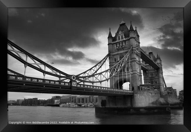 Monochrome Tower Bridge from the side Framed Print by Ann Biddlecombe