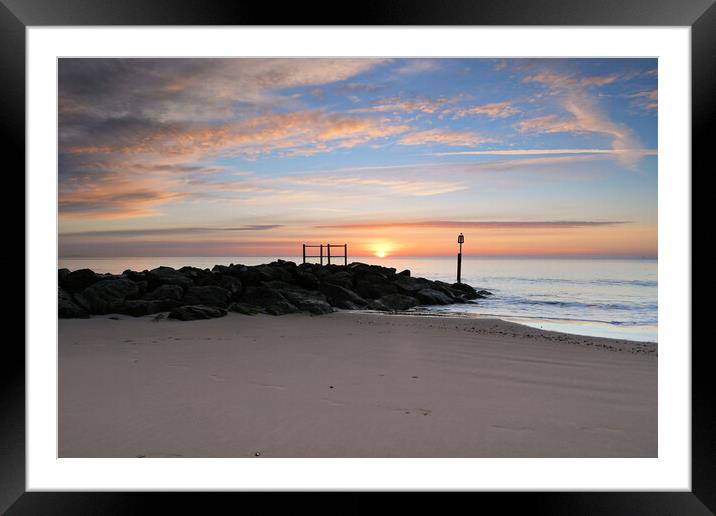 A Serene Winter Sunrise at Branksome Chine Beach Framed Mounted Print by paul cobb