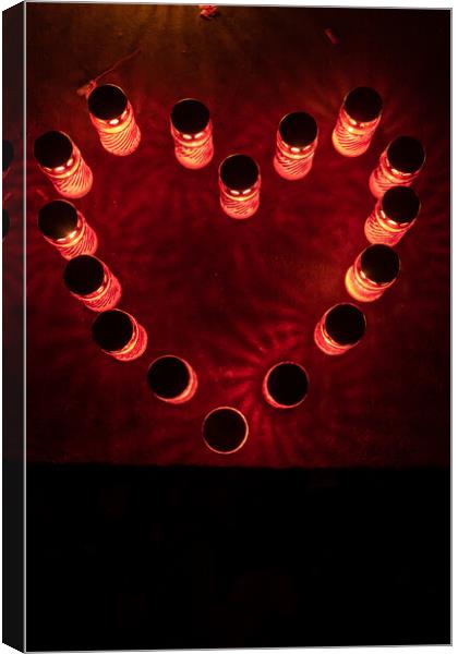 Heart Of Red Candle Lights At Night  Canvas Print by Artur Bogacki